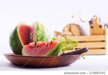 Slices of watermelons on a table 113665341