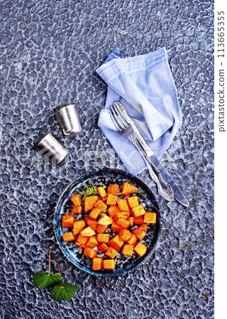 Stir-fried pumpkin on plate . Diet food 113665355