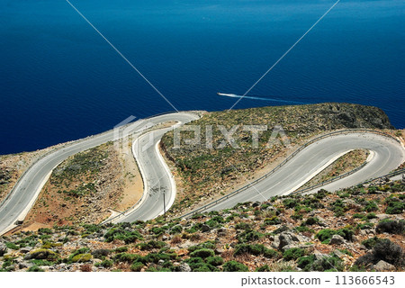 Winding mountain road on the sea coast (Crete South Coast) Winding mountain road on the sea coast (Crete South Coast) 113666543