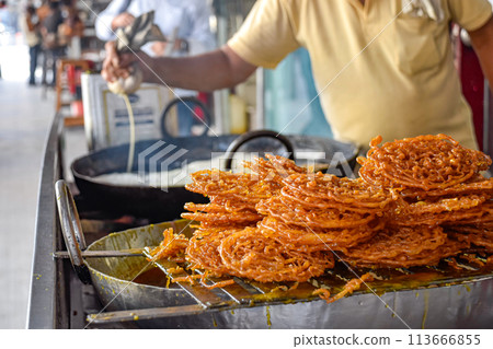 Traditional Jalebi. Indian desserts in pastry shop and street food on markets 113666855