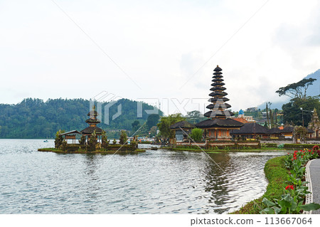 Pagoda at the sacred temple of Pura Ulun on Lake Bratan on the popular touristic island of Bali. Pagoda at the sacred temple of Pura Ulun on Lake Bratan on the popular touristic island of Bali. 113667064