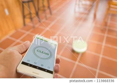 robotic vacuum cleaner working 113668336