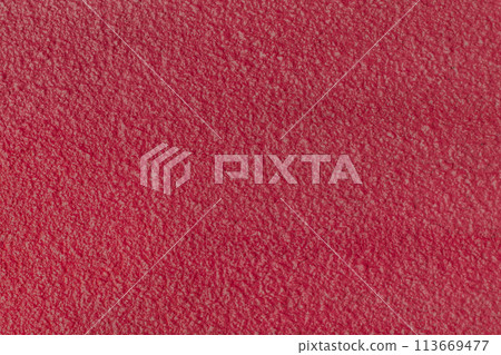 Rough wall plaster concrete crimson color solid surface stucco cement structure background texture abstract 113669477