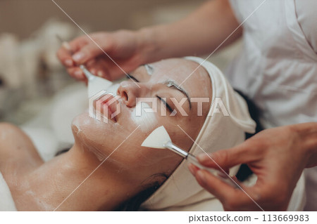 woman at the cosmetologist. She has problem skin and acne. woman at the cosmetologist. She has problem skin and acne. 113669983