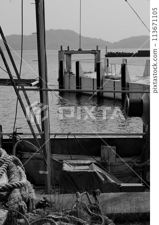 Fishing boat anchored at the fishing port Fishing boat anchored at the fishing port 113671105