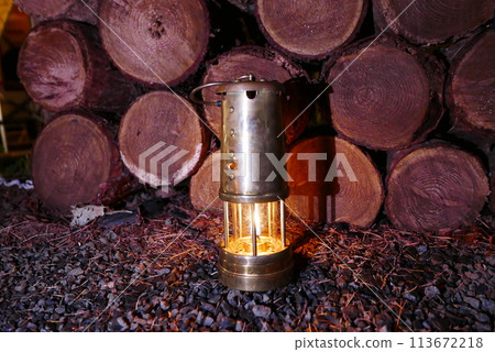 Camping at Lake Kawaguchi, Mt. Fuji in Japan. Beautiful warm light oil lamps, gasoline lanterns and logs. Camping at Lake Kawaguchi, Mt. Fuji in Japan. Beautiful warm light oil lamps, gasoline lanterns and logs. 113672218