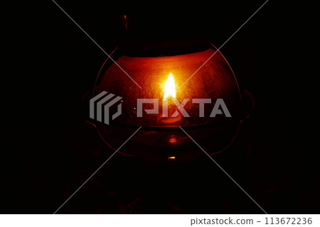 Camping at Lake Kawaguchi, Mt. Fuji in Japan. Beautiful warm light oil lamps, gasoline lanterns and logs. 113672236