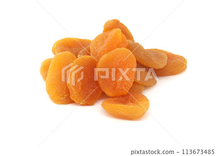 Dried apricots fruits isolated on white background Dried apricots fruits isolated on white background 113673485