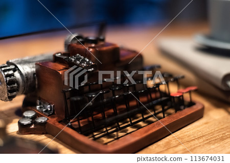 typewriter with a cup of coffee 113674031