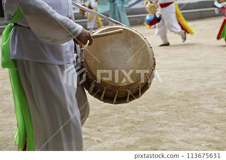people in traditional costumes dance event 113675631