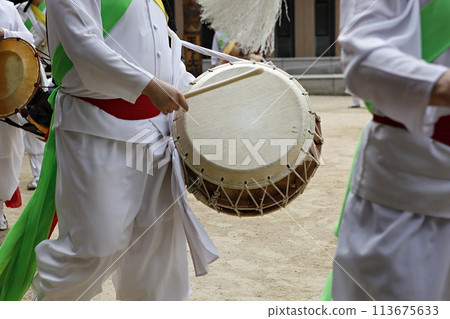 people in traditional costumes dance event 113675633