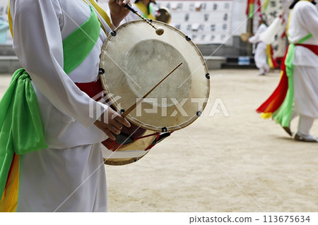 people in traditional costumes dance event 113675634