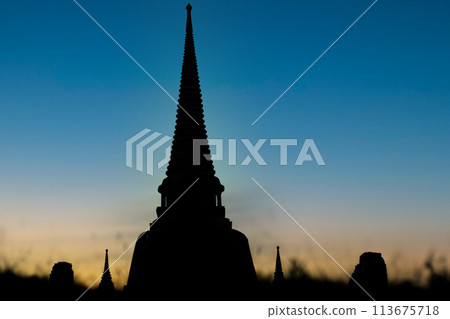 The Situated old Thai temple on twilight time The Situated old Thai temple on twilight time 113675718