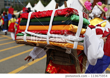 colorful clothes on sale at the market 113675954