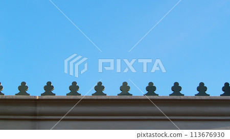top of the Roof on blue sky. Picture for use as Background image or copy space top of the Roof on blue sky. Picture for use as Background image or copy space 113676930