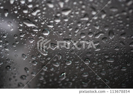 water drops on black background water drops on black background 113678854