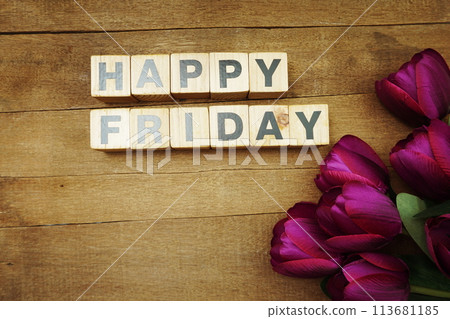 Happy Friday alphabet letter with tulip flower on wooden background Happy Friday alphabet letter with tulip flower on wooden background 113681185