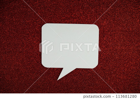 White Speech bubble mockup top view on red glitter background 113681280