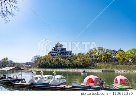 Okayama Prefecture: Okayama Castle seen from the moat side and the dock for the Swan Boat and Peach Boat Okayama Prefecture: Okayama Castle seen from the moat side and the dock for the Swan Boat and Peach Boat 113681350