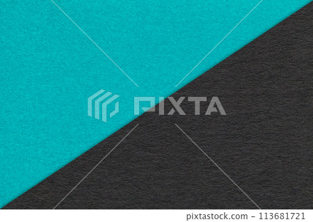 Texture of craft turquoise and black paper background, half two colors, macro. Vintage kraft cerulean cardboard. Texture of craft turquoise and black paper background, half two colors, macro. Vintage kraft cerulean cardboard. 113681721