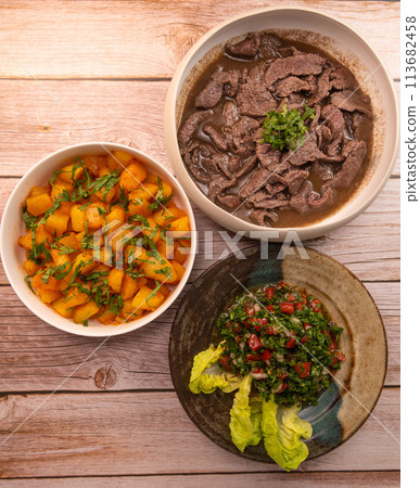 LEBANESE RECIPE, SHAWARMA, SPICY BEEF AND POTATOES, BATTATA HARA, GARLIC, CORIANDER AND PAPRIKA AND 113682458