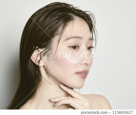 Portrait of a young woman on a white background with a summer image 113683627