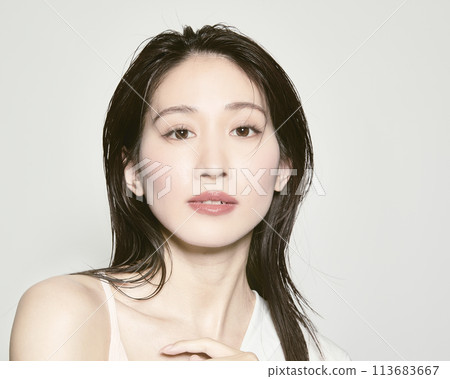 Portrait of a young woman on a white background with a summer image 113683667