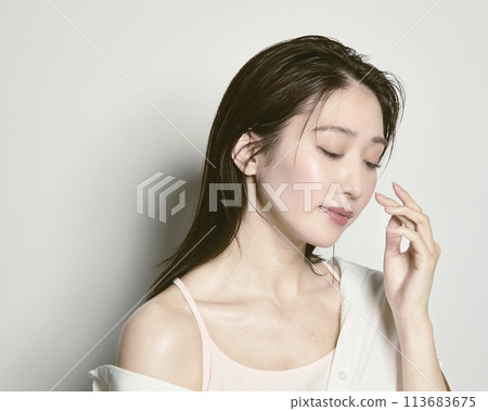 Portrait of a young woman on a white background with a summer image 113683675