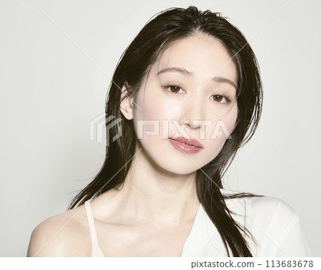Portrait of a young woman on a white background with a summer image 113683678