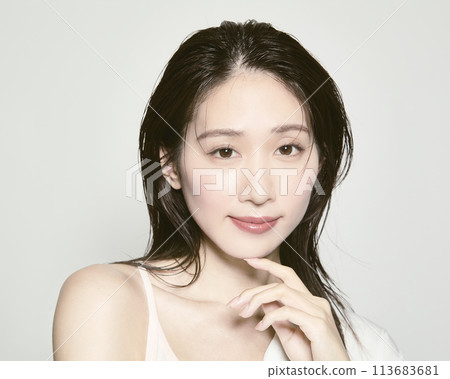 Portrait of a young woman on a white background with a summer image 113683681