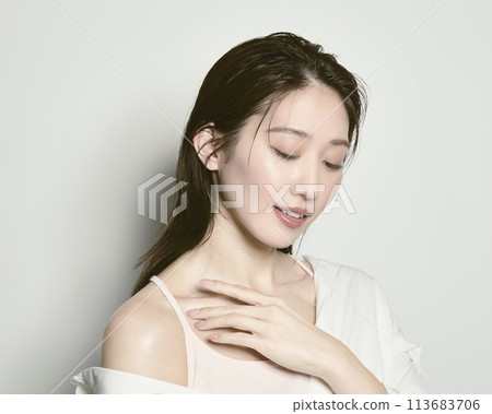 Portrait of a young woman on a white background with a summer image 113683706
