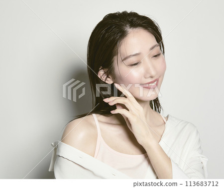 Portrait of a young woman on a white background with a summer image 113683712