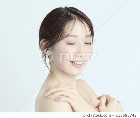 Close-up upper body portrait of a young woman on a white background Close-up upper body portrait of a young woman on a white background 113683742