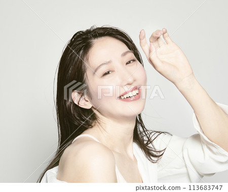 Portrait of a young woman on a white background with a summer image Portrait of a young woman on a white background with a summer image 113683747