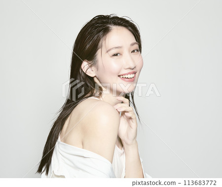 Portrait of a young woman on a white background with a summer image 113683772