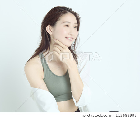 Portrait of a healthy young woman on white background Portrait of a healthy young woman on white background 113683995