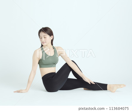 Portrait of a healthy young woman on white background Portrait of a healthy young woman on white background 113684075