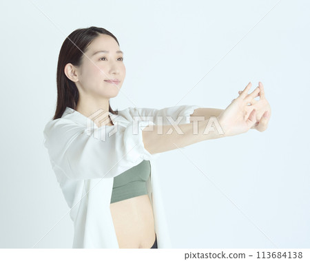 Portrait of a healthy young woman on white background Portrait of a healthy young woman on white background 113684138