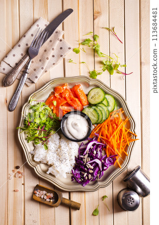 salmon salad with rice, fresh vegetables and sunflowers seed salmon salad with rice, fresh vegetables and sunflowers seed 113684481