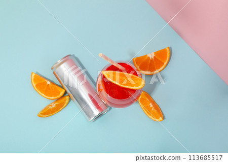 Cocktail with fresh oranges on a blue background 113685517