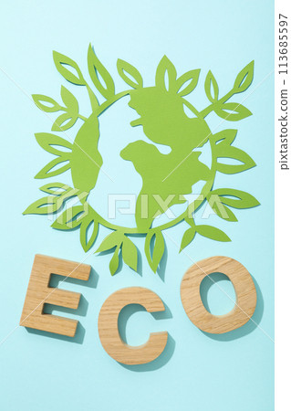 The word eco with a paper model of the Earth 113685597