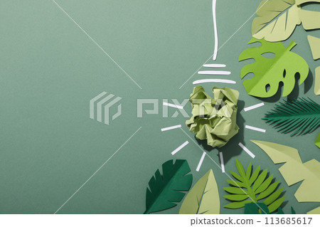 A light bulb made of crumpled paper, the concept of an eco house A light bulb made of crumpled paper, the concept of an eco house 113685617