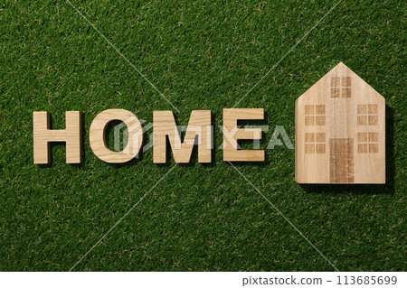 The word home in wooden letters on green grass The word home in wooden letters on green grass 113685699