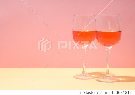 Cocktail in a glass on a light background Cocktail in a glass on a light background 113685815