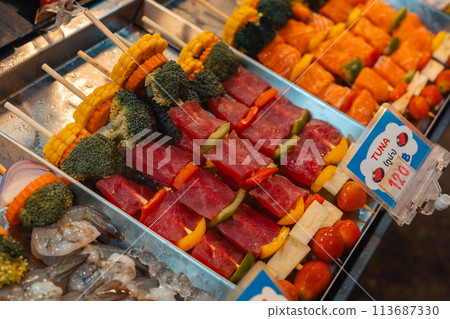 Seafood barbecue skewers for sale at street food 113687330