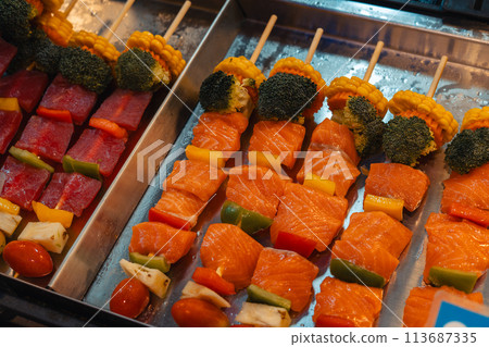 Seafood barbecue skewers for sale at street food 113687335