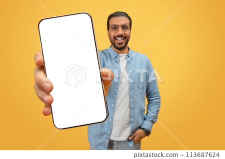 Man showing blank smartphone screen 113687624
