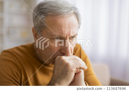 Elderly person with hand on neck feeling pain Elderly person with hand on neck feeling pain 113687696