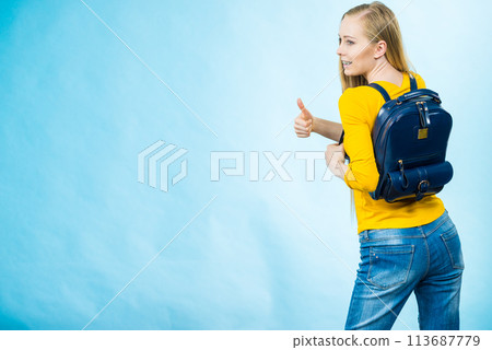 Young woman going to school 113687779
