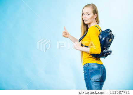 Young woman going to school 113687781